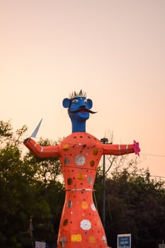 Ravnans being ignited during Dussera festival at ramleela ground in Delhi, India, Big statue of Ravana to get fire during the Fair of Dussera to celebrate the victory of truth by Lord Rama photo
