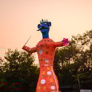 Ravnans being ignited during Dussera festival at ramleela ground in Delhi, India, Big statue of Ravana to get fire during the Fair of Dussera to celebrate the victory of truth by Lord Rama photo