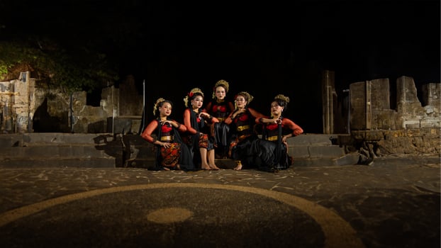 a group of dancers were seen relaxing with their friends and creating a warm atmosphere photo