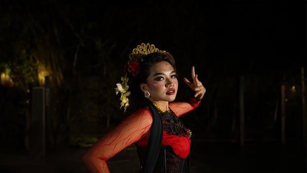 an Indonesian dancer with sparkling stage lights that create the impression of luxury and elegance photo