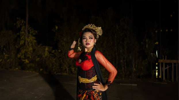 an Indonesian dancer with sparkling stage lights that create the impression of luxury and elegance photo