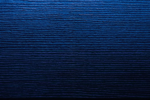 Dark abstract background of wooden, color of phantom blue. photo