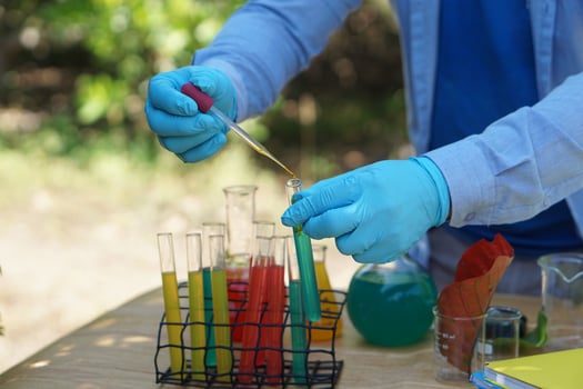 Colorful chemical substances in glass test tubes. Concept, science experiment, Chemistry lesson. Learning by doing. Science subject, project work. Experiment, education photo