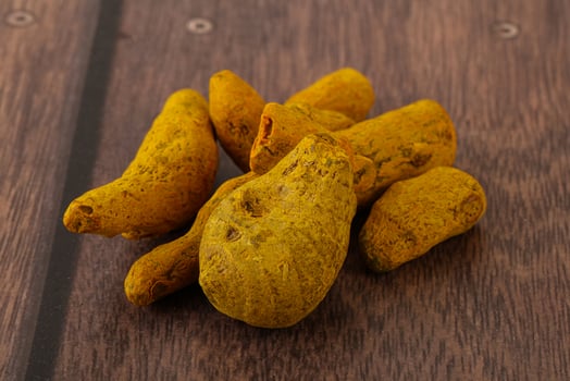 Indian spices - Turmeric root Curcuma photo