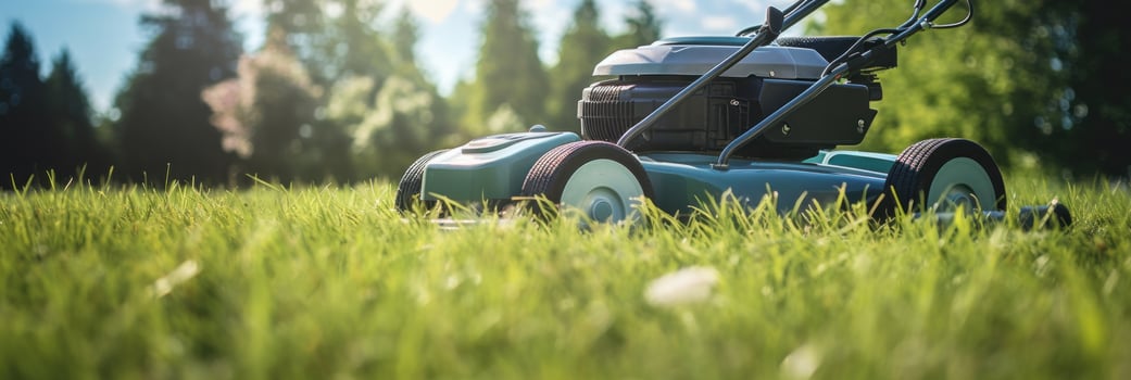 AI generated lawn mower on a green lawn with sunlight in the background photo