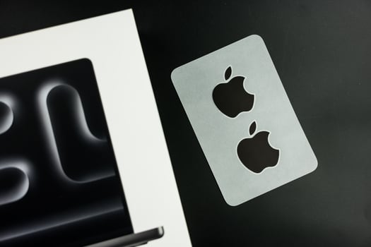 Bangkok, Thailand - December 24, 2023 Black Apple Computers logo sticker comes with MacBook Pro M3,the latest MacBook Pro in 2023 photo