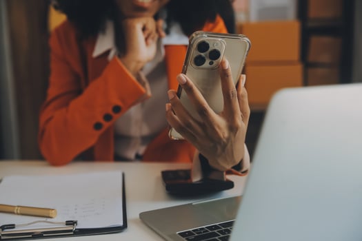 Startup SME small business entrepreneur of freelance Asian woman using a laptop with box Cheerful success happy Asian woman her hand lifts up online marketing packaging and delivery SME idea concept photo