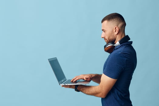 Man young using guy online businessman typing laptop job person man happy work computer caucasian photo