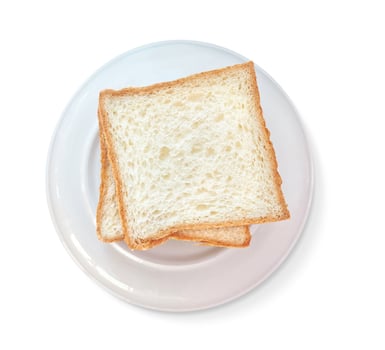 Bread slices on plate isolated on white background photo