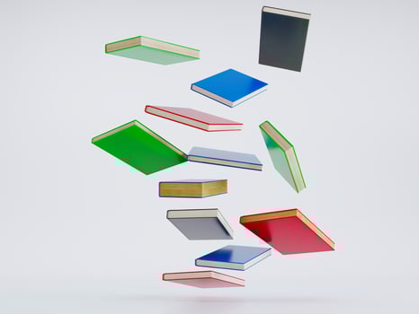 Colorful hardcover books flying on white background, Stack of books in colour covers photo