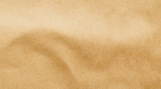 Brown paper eco recycled kraft sheet texture cardboard background photo