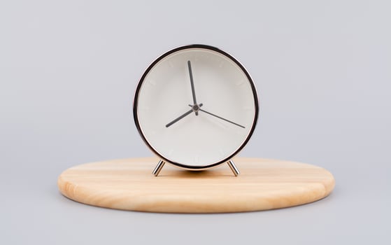 Time and work of every day Photo of a modern alarm clock in a studio