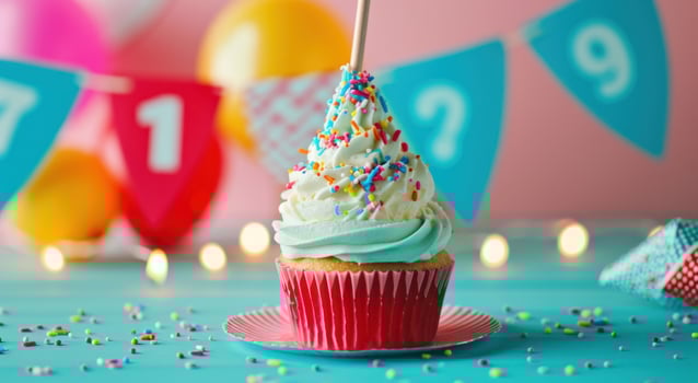 AI generated a cupcake in front of a numbered birthday party flag photo