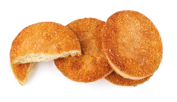 Beautiful round cookies isolated on a white background. Whole and broken cookies. photo