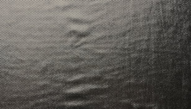 Black fabric with foil elements, thermal underwear fabric photo