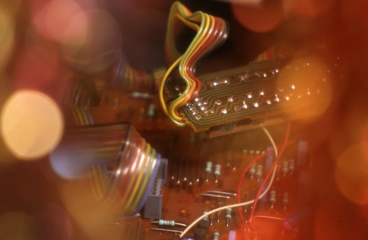 a close up of a circuit board with wires photo