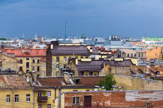 view of the roofs of the historical center of St. Petersburg during the rain photo
