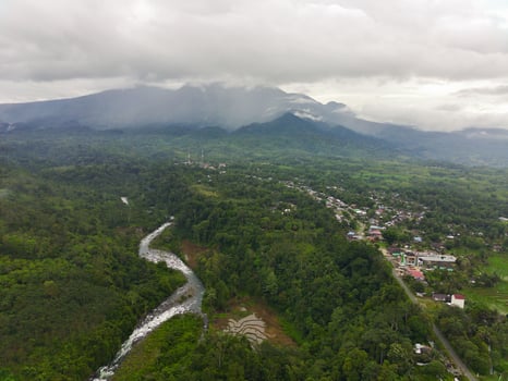 the beauty of the morning panorama with sunrise in indonesia village photo
