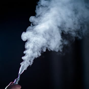 steam Smoke over black background. Fog or steam texture. Hot photo