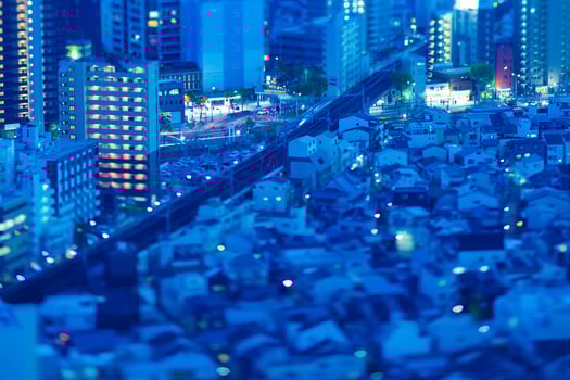 A dusk miniature cityscape by high angle view near the railway in Osaka photo