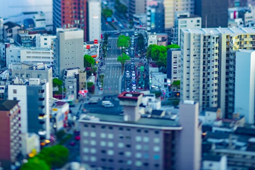 A dusk miniature cityscape by high angle view at the urban street in Osaka photo