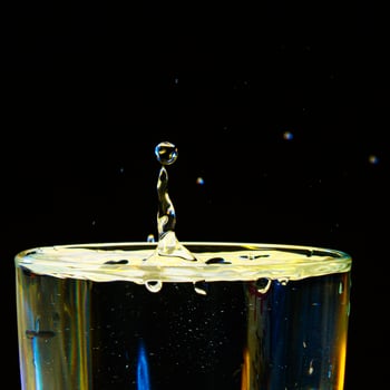 macro Beautiful drops in flight, colored drops photo