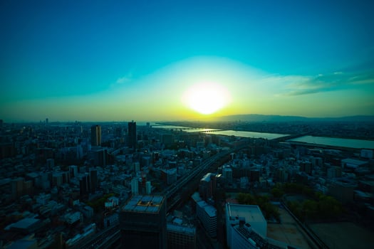 A sunset panoramic cityscape near Yodo river in Osaka wide shot photo