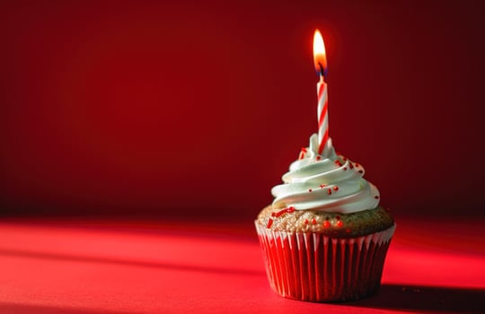 AI generated cupcake with a candle against red background, photo