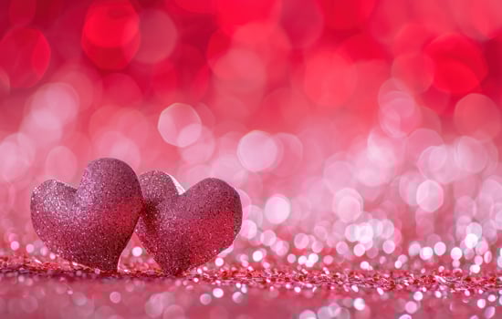 AI generated two heart shapes standing on a pink background photo
