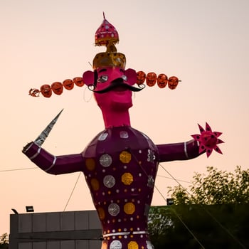 Ravnans being ignited during Dussera festival at ramleela ground in Delhi, India, Big statue of Ravana to get fire during the Fair of Dussera to celebrate the victory of truth by Lord Rama photo