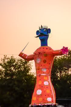 Ravnans being ignited during Dussera festival at ramleela ground in Delhi, India, Big statue of Ravana to get fire during the Fair of Dussera to celebrate the victory of truth by Lord Rama photo