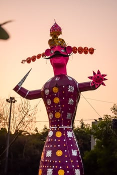 Ravnans being ignited during Dussera festival at ramleela ground in Delhi, India, Big statue of Ravana to get fire during the Fair of Dussera to celebrate the victory of truth by Lord Rama photo