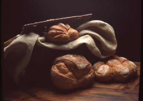 a basket with bread and bread rolls photo