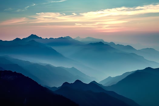 AI generated A tranquil scene of layered mountains bathed in the soft glow of sunset, showcasing nature's grandeur. photo
