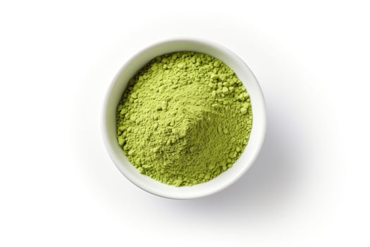 AI generated Matcha green tea powder in a bowl isolated on a white background. photo