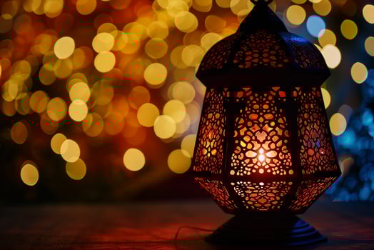 AI generated Ornamental Arabic lantern with burning candle glowing at night invitation for Muslim holy month Ramadan Kareem photo