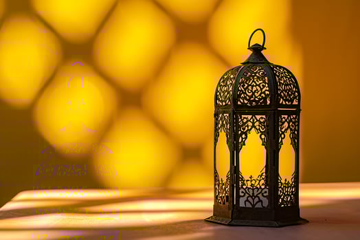 AI generated An Arabic lantern on yellow background photo