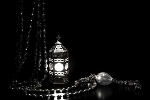 AI generated Black and white Arabic lantern glowing for Muslim holy month Ramadan Kareem photo