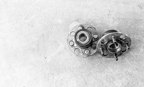 Bearing of car wheel remove and change on the cement floor maintenance concept and part for copy space photo