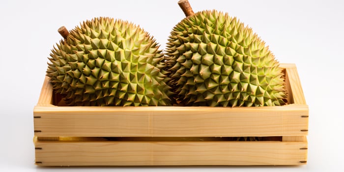 AI generated Closeup of Fresh Durian Fruit. Durian in a Basket. Generative AI photo