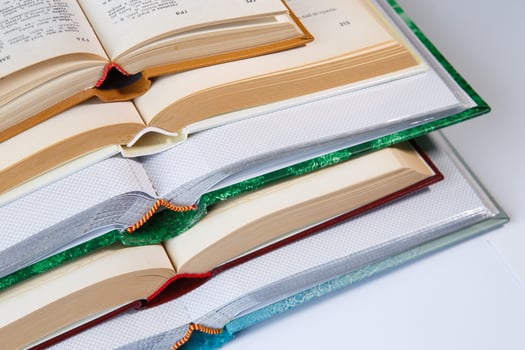 Pile of open books photo