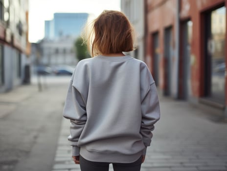 AI generated Walking woman back view wearing oversize dark grey gildan photo