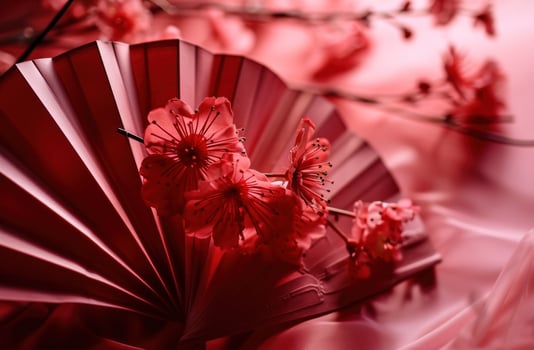 AI generated an origami paper fan in red with pink flowers photo