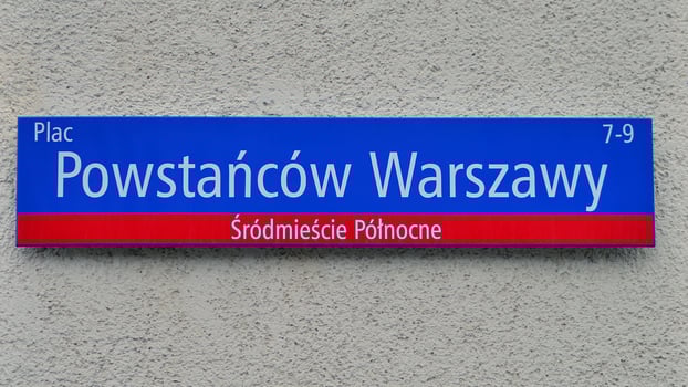 Warsaw, Poland. 29 December 2023.Sign with street name  Plac Powstancow Warszawy photo