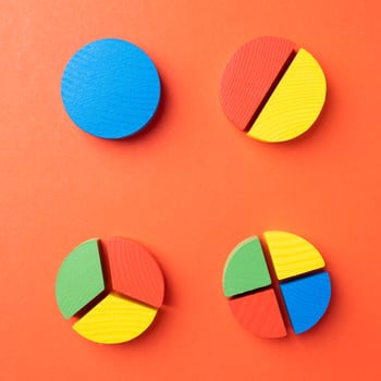 Colorful wooden pie chart pieces photo