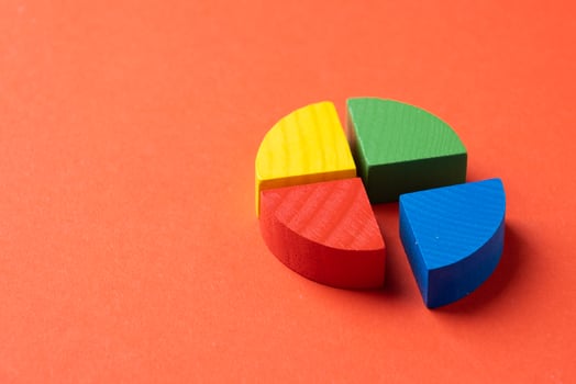 Colorful wooden pie chart pieces photo