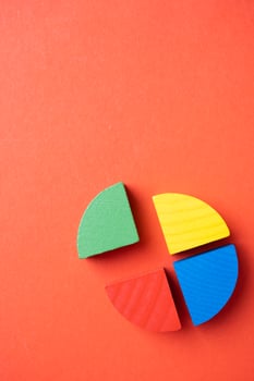 Colorful wooden pie chart pieces photo