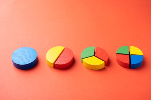 Colorful wooden pie chart pieces photo