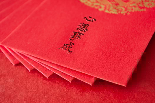 Top and close up view of Chinese New Year red packets. photo