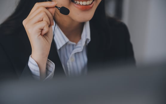 Communication support, call center and customer service help desk. VOIP headset on telephone keyboard. photo